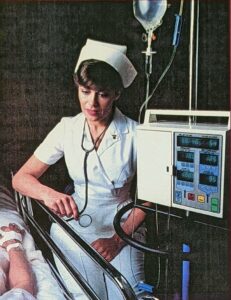 Nurse administering an IV Image